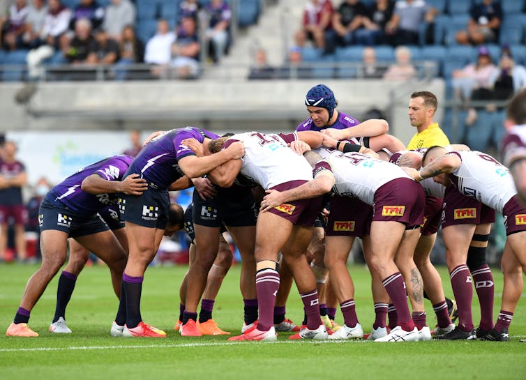 A scrum during an NRL match between the Melbourne Storm and Manly Sea Eagles