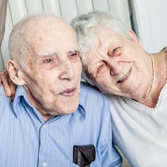 Portrait of elderly couple at home