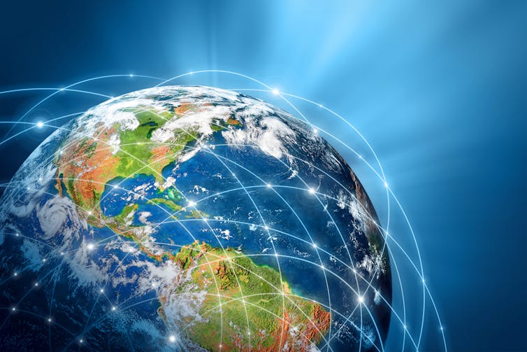 Planet Earth overlaid with network of connected lights