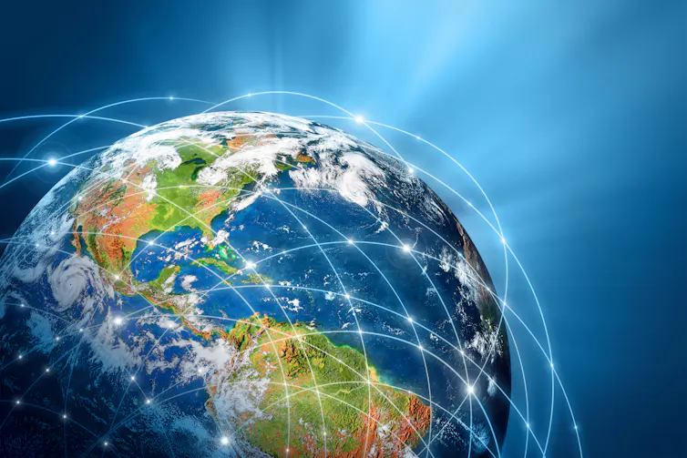 Planet Earth overlaid with network of connected lights