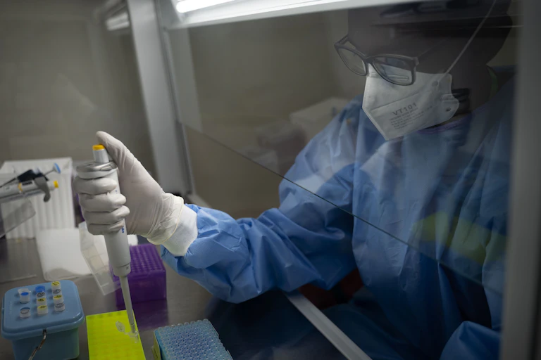 A scientist working in lab