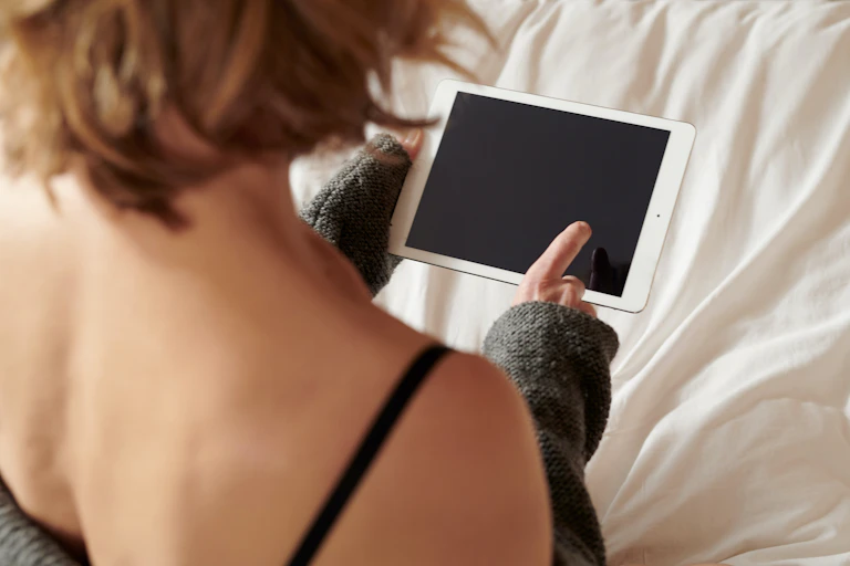 Woman looking at tablet