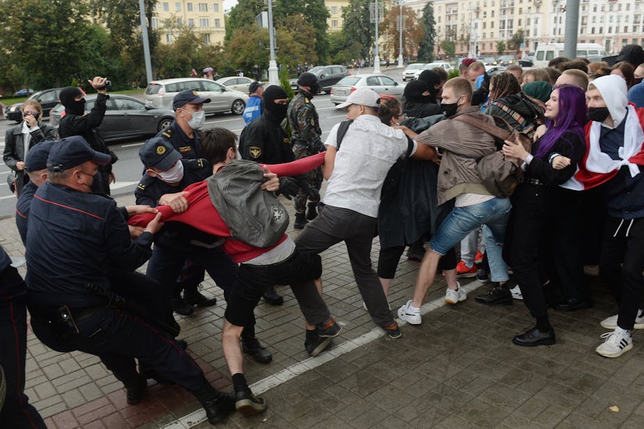 Young Belarusians being arrested by police in Minsk
