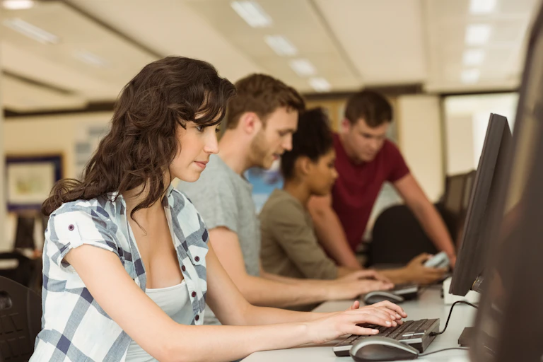University students working at computer terminals