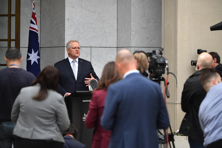 Scott Morrison addresses a press conference