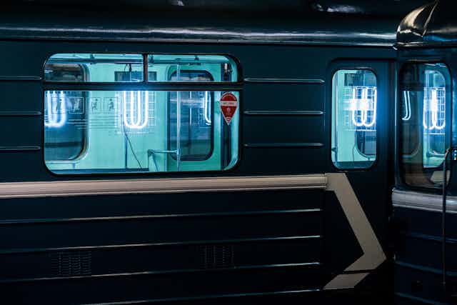 ultraviolet light disinfecting the interior of empty Moscow subway car