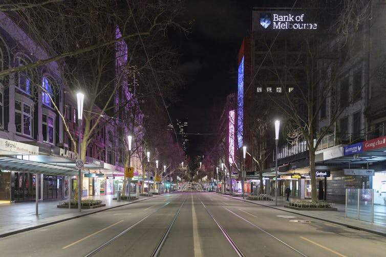 An empty Melbourne street at night.