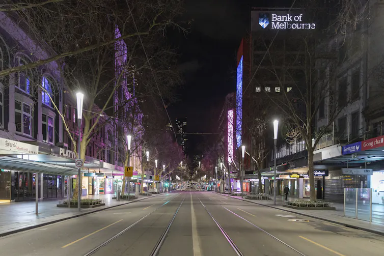 An empty Melbourne street at night.