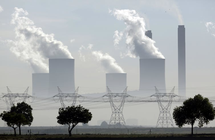 Steam billows from a coal-fired power station