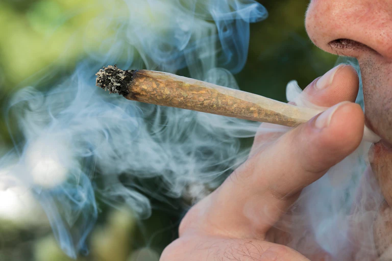cannabis joint being smoked