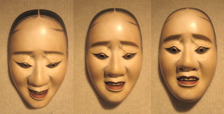 Pictures of the same mask with different expressions depending on the angle.