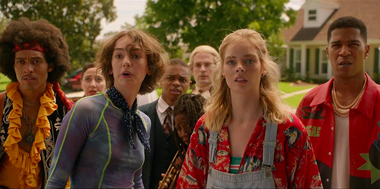 Movie still, daughters and musicians