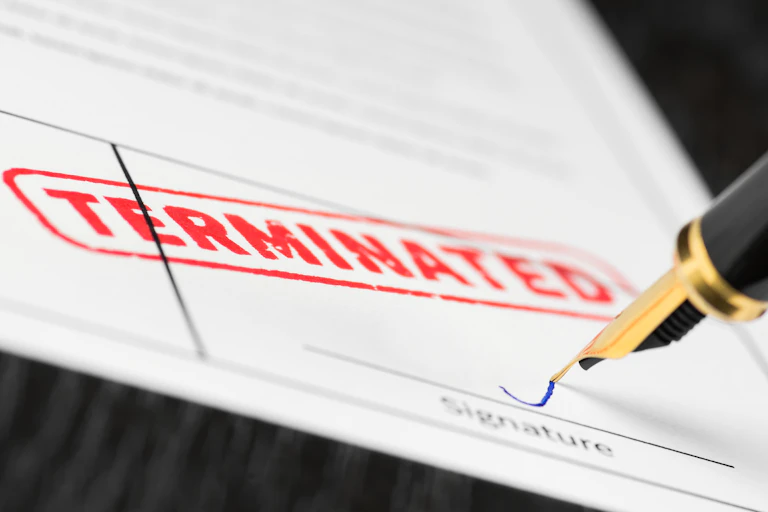 Terminated stamp on a contract being signed