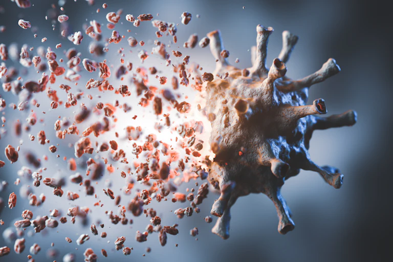 Illustration of COVID-19 virus breaking apart