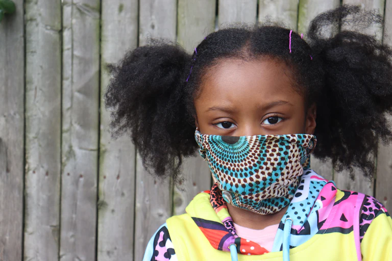 Black girl in face mask