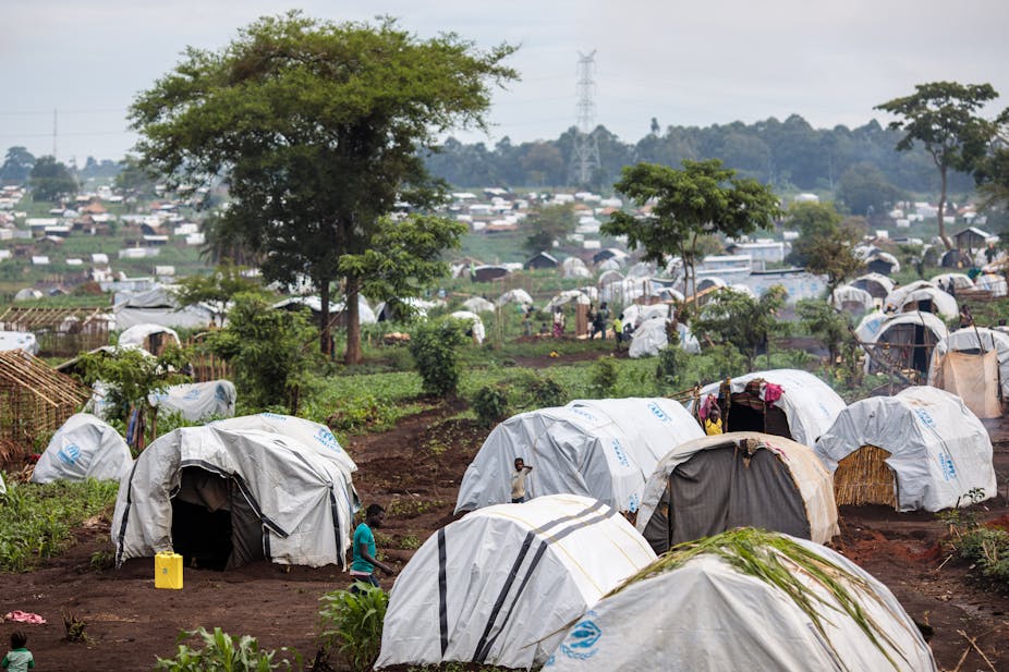 Landscape full of white tents