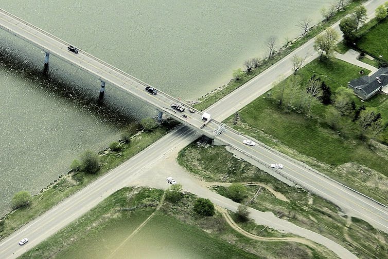 An areal view of a highway blockade over Grand River.