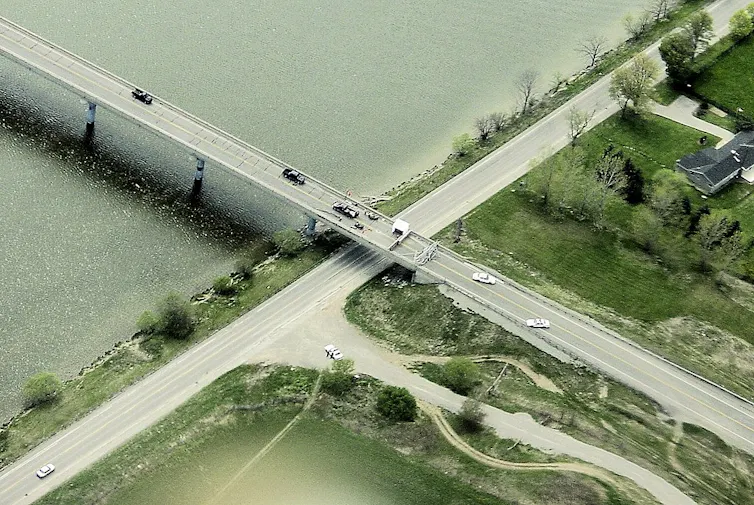 An areal view of a highway blockade over Grand River.