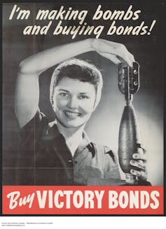 A wartime advertisement showing a woman holding a bomb