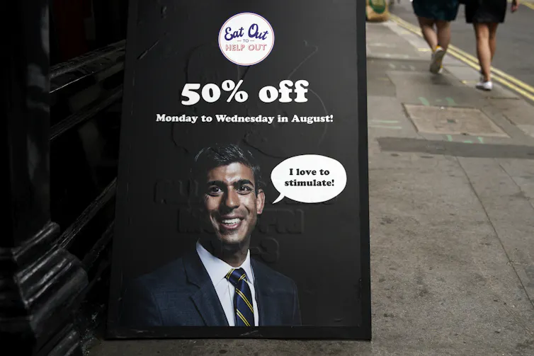 Billboard advertising Eat Out to Help Out with picture of Chancellor Rishi Sunak