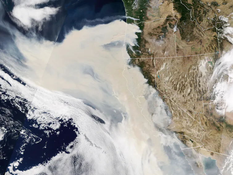 Satellite image of smoke drifting off the Pacific coast from California and Oregon.