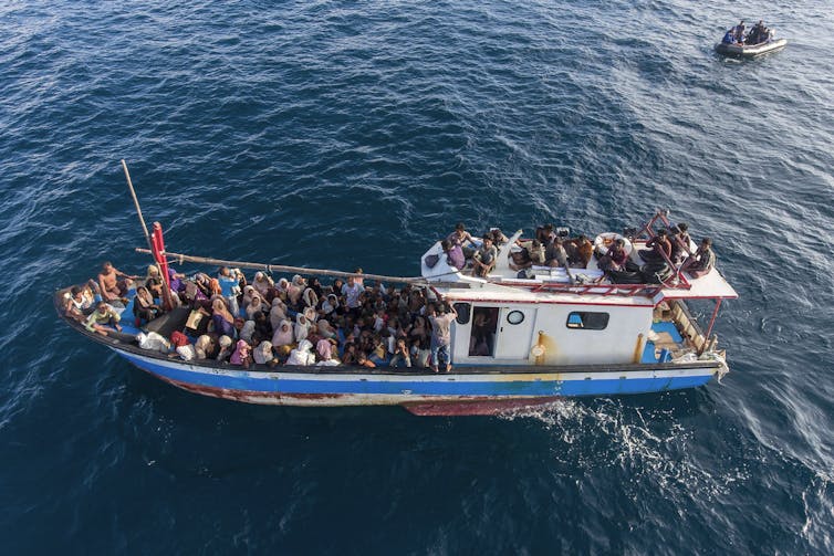 A boat carries ethnic Rohingya off North Aceh, Indonesia, in June 2020.