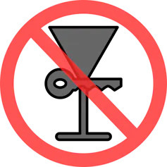 A martini glass and a key in a circle with a red line through it.