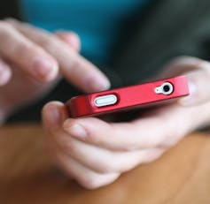 Hands on a smartphone
