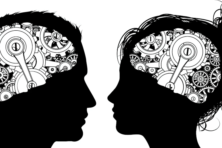Siluetas negras de cabezas de hombre y mujer con engranajes mecánicos dibujados sobre el cerebro.