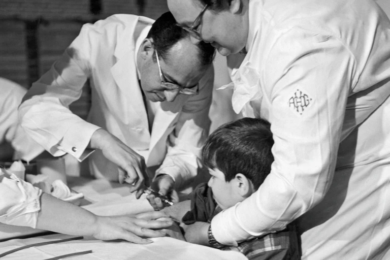 Salk personally gave this 8-year-old boy a trial polio vaccine in Pittsburgh, Pennsylvania in February 1954.