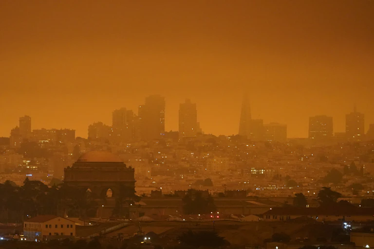 An orange haze settles over the San Francisco skyline.