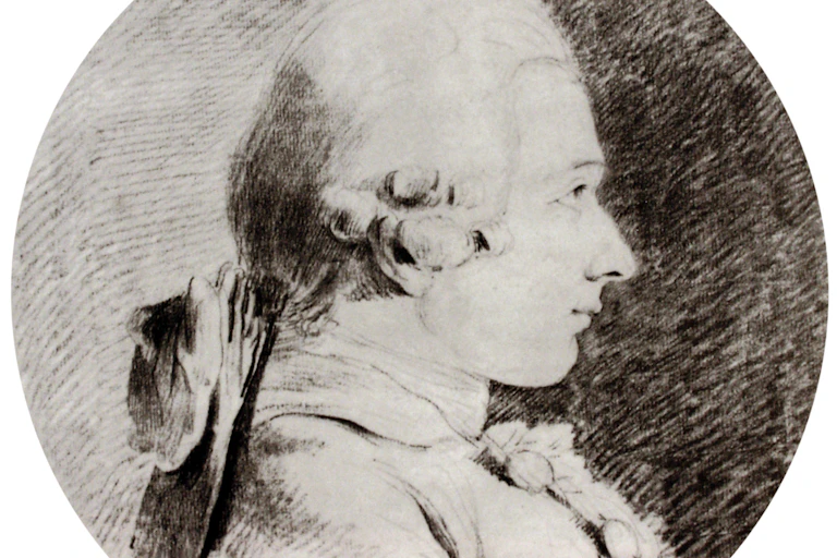 Profile portrait of young man in 18th-century wig.