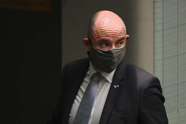 Federal Minister for Government Services Stuart Roberts wearing a mask.