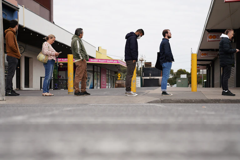 Job seekers lined up outside Centrelink in Melbourne.