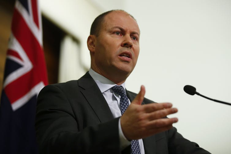 Treasurer Josh Frydenberg speaking at a press conference.