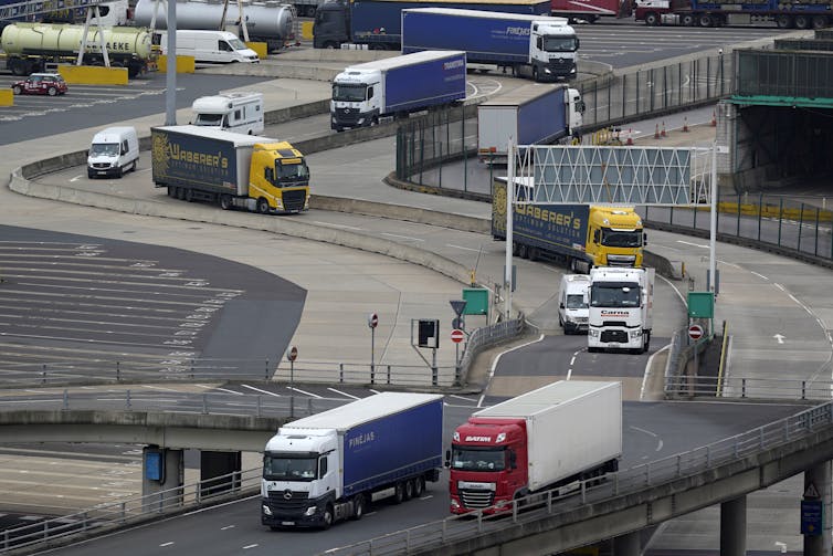 Lorries arrive at the ferry terminal in Dover.