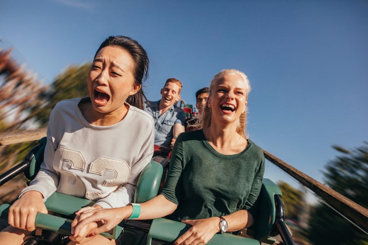 Girls screaming on rollercoaster