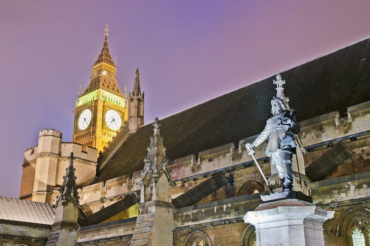 The UK houses of parliament at night.