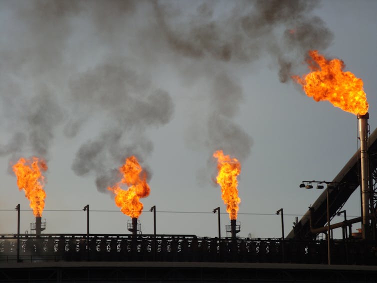 Gas flaring from an industrial plant