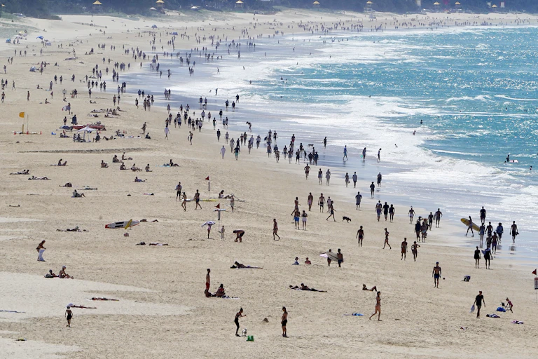 Crowds of people on a beach