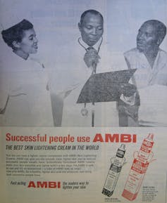 An advert showing a doctor and nurse consulting with a darker-skinned male patient, the doctor holding a clipboard.