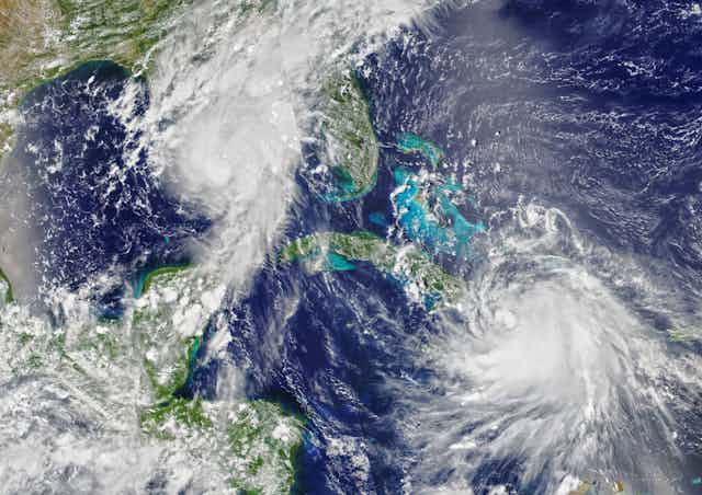 A satellite image of Hurricanes Marco and Laura.