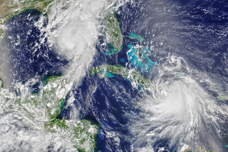A satellite image of Hurricanes Marco and Laura.