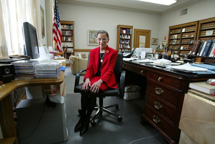 Supreme Court Justice Ruth Bader Ginsburg sitting in her chambers in 2002.