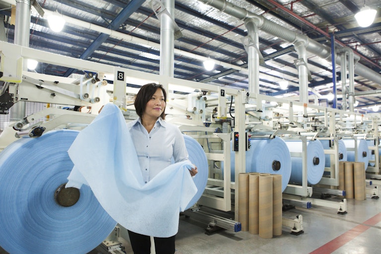 Woman in clothing factory.