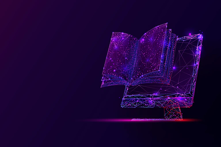 A book emerges from a computer screen.