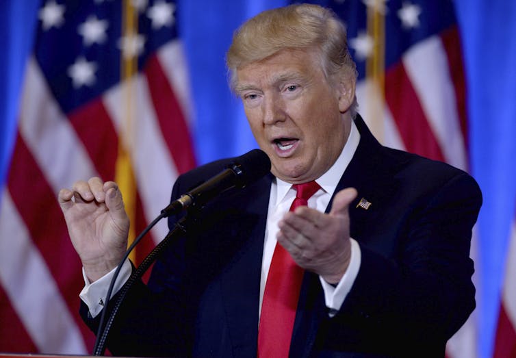 US President Donald Trump gestures while speaking.