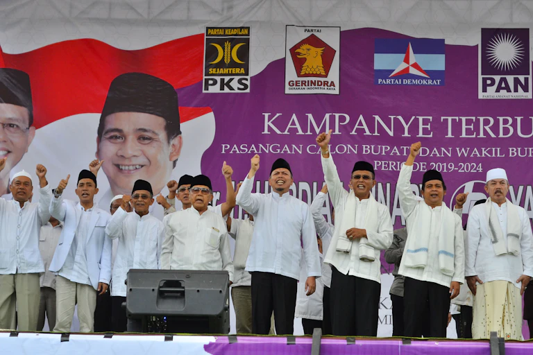 Political candidates on a stage at a campaign event in West Java, Indonesia