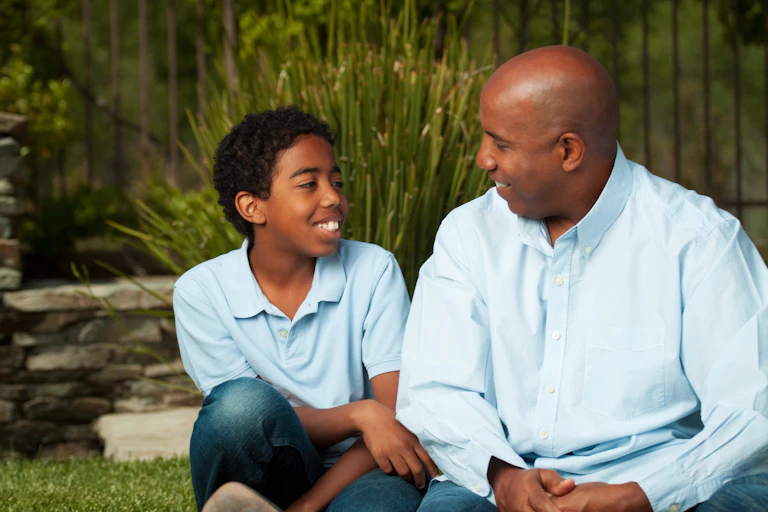 Father and son talking