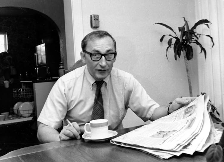 Mike Royko, having breakfast and a cigarette.